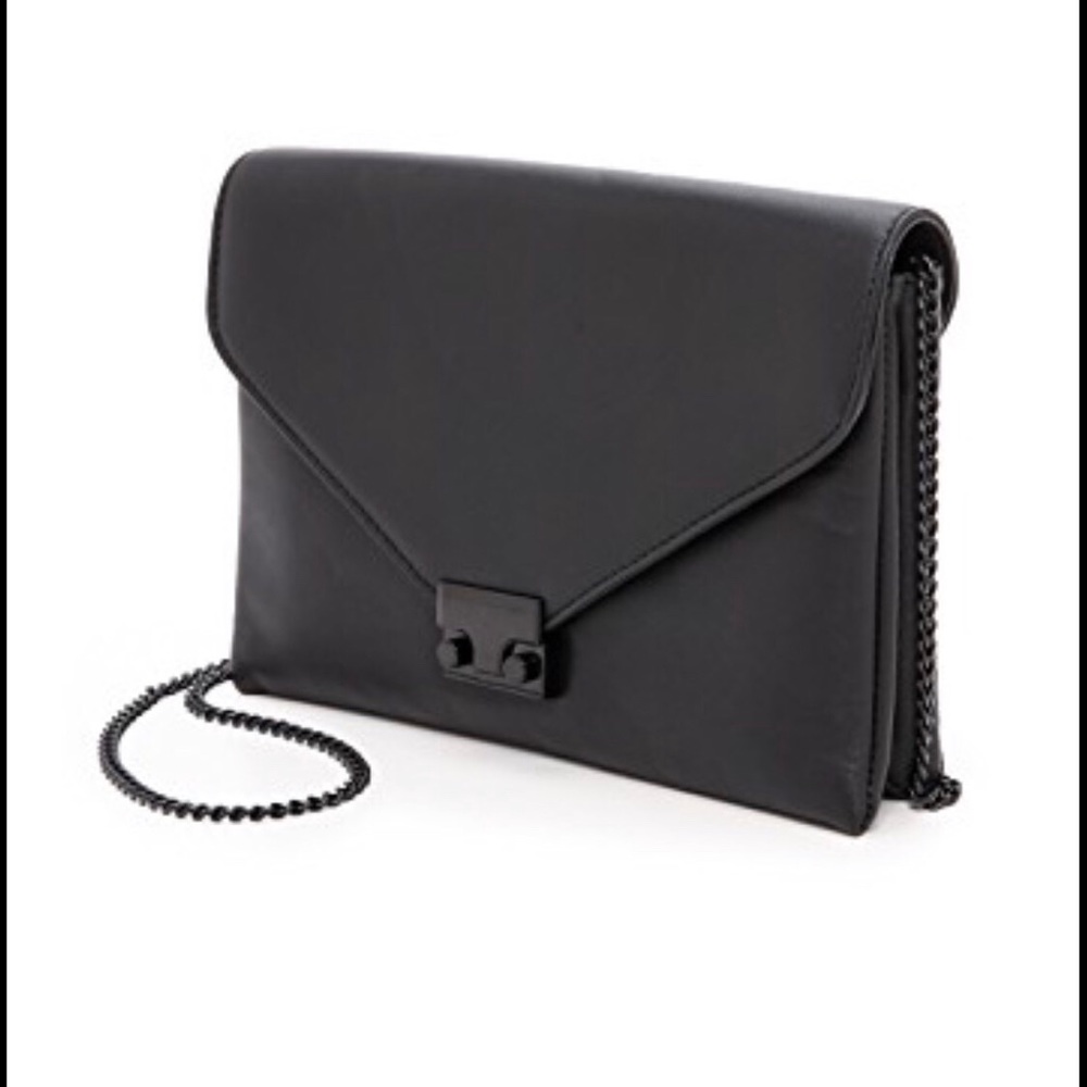 Leoffler Randall signature lock leather clutch